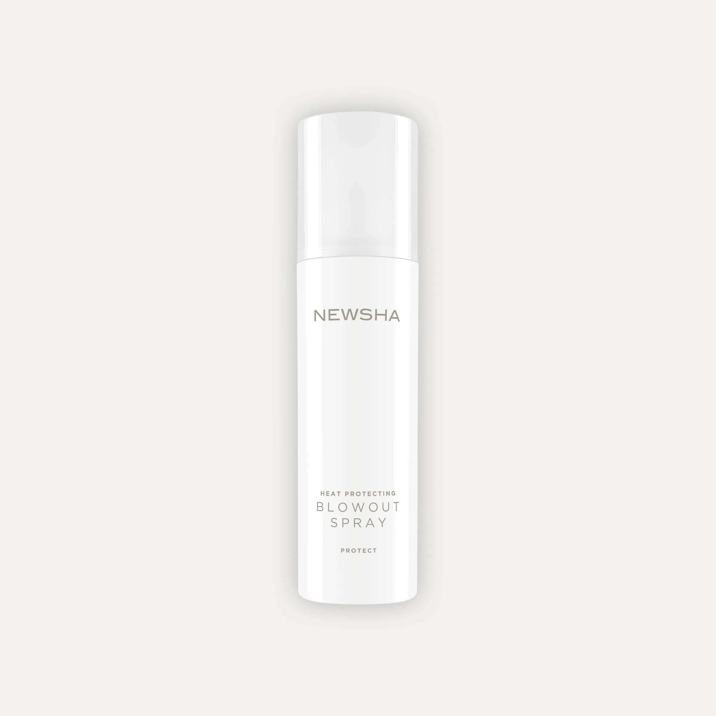 Wei&szlig;es NEWSHA Heat Protecting Blowout Spray in schlanker Flasche vor hellem Hintergrund.