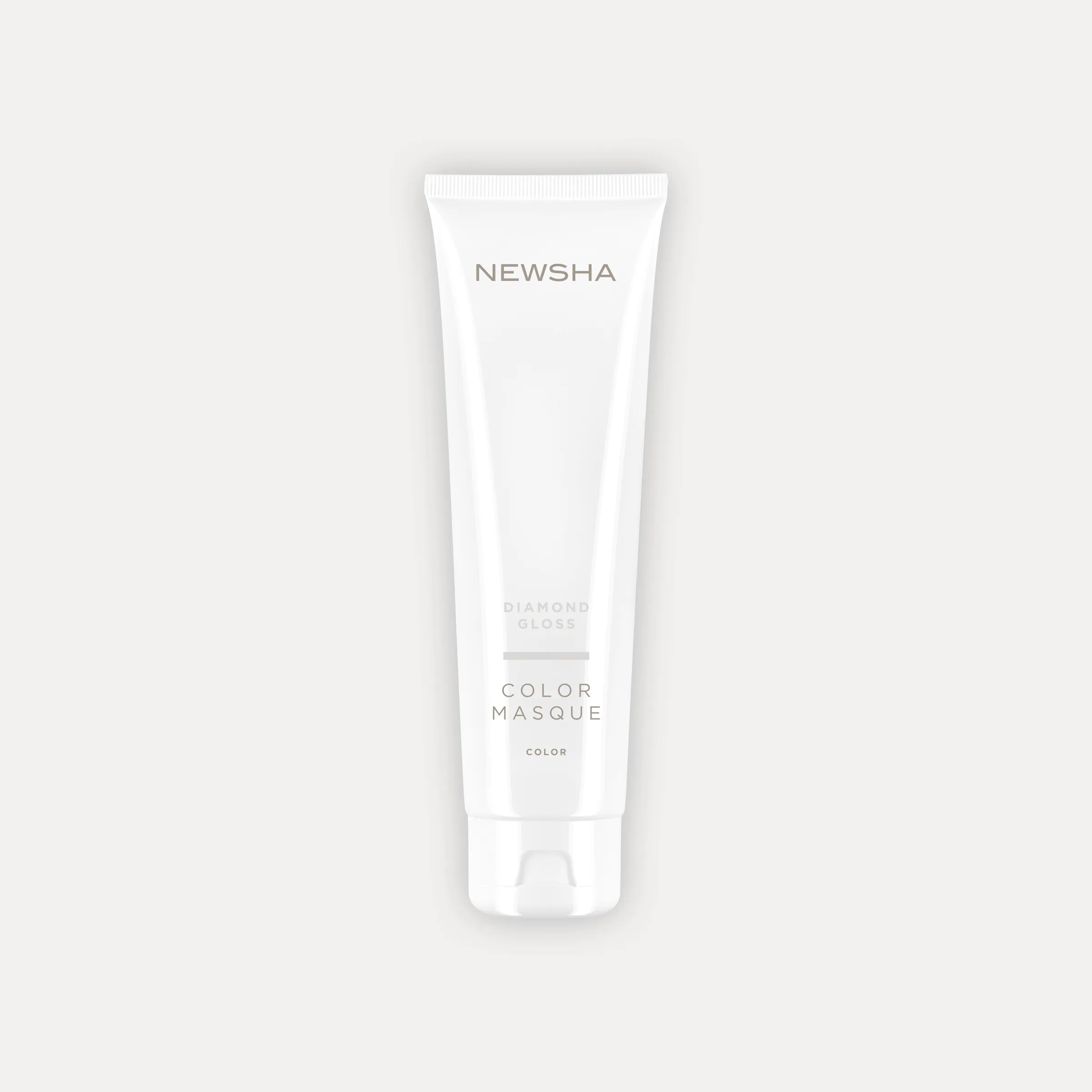 NEWSHA Color Masque Diamond Gloss in wei&szlig;er Tube vor hellem Hintergrund als minimalistisches Produktbild.